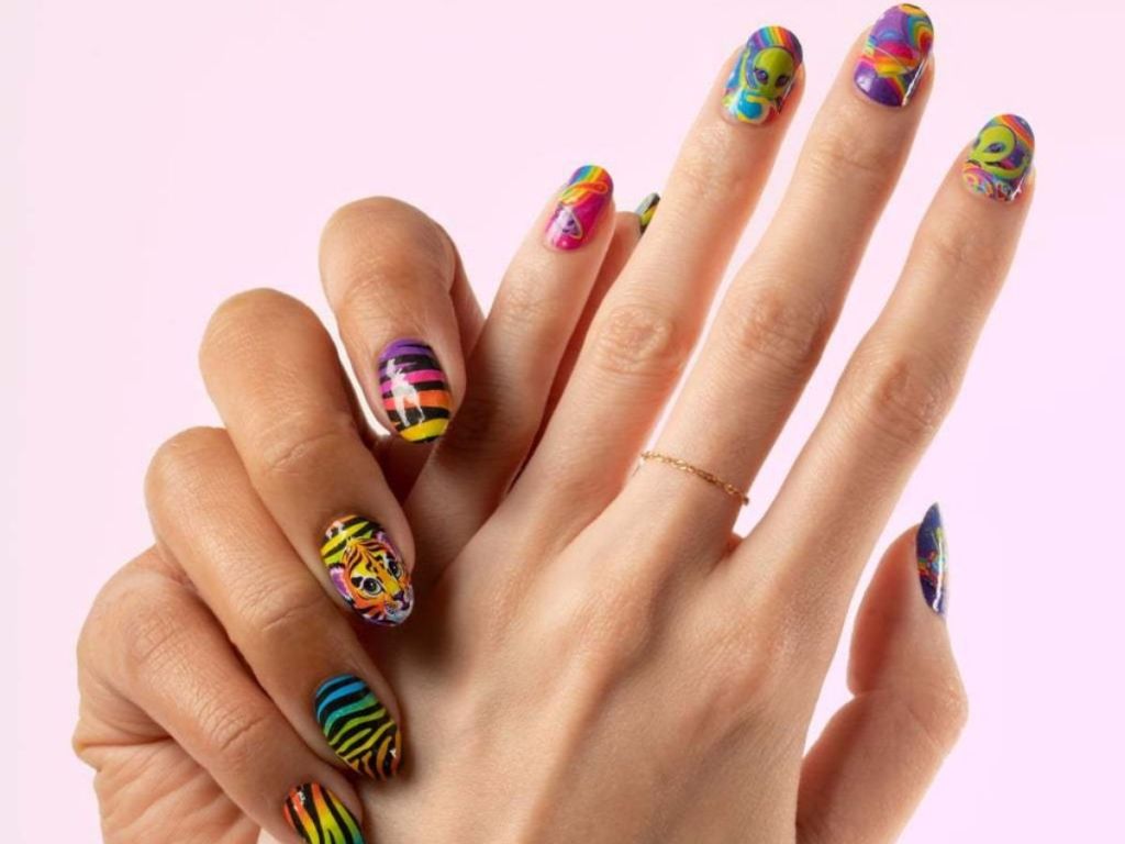 hands with designs on nails
