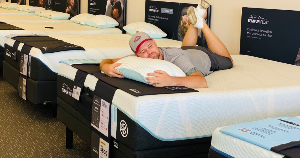 man sleping on mattress