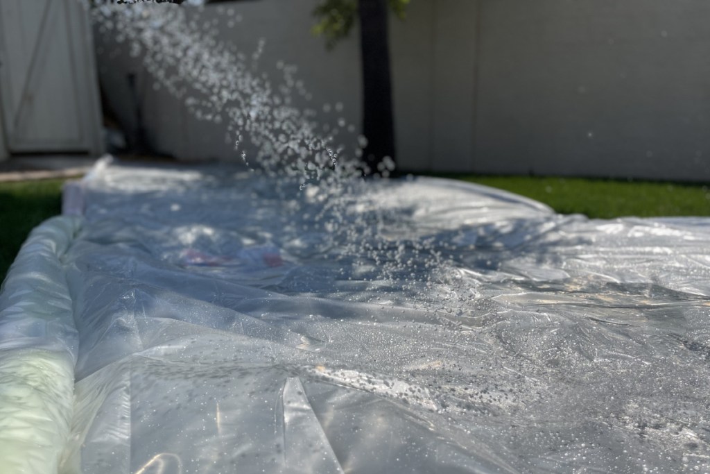 adding water on slip and slide