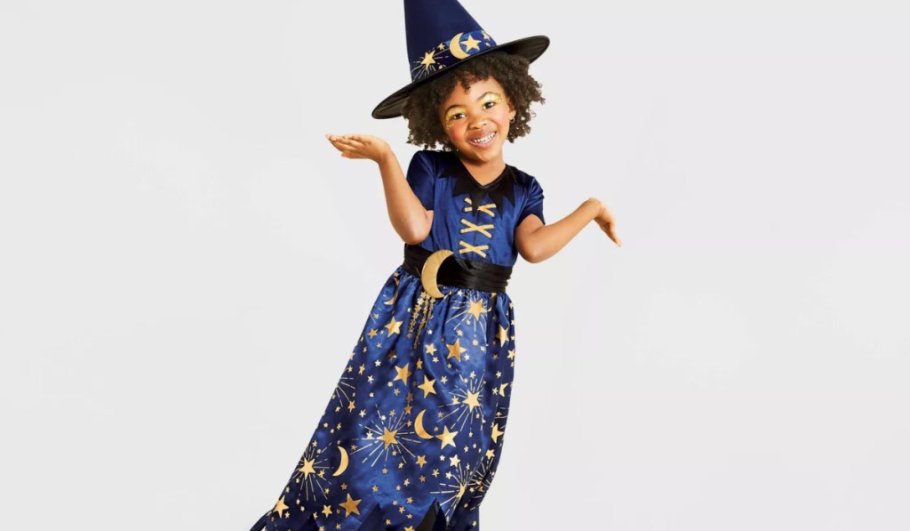 Child in witch costume