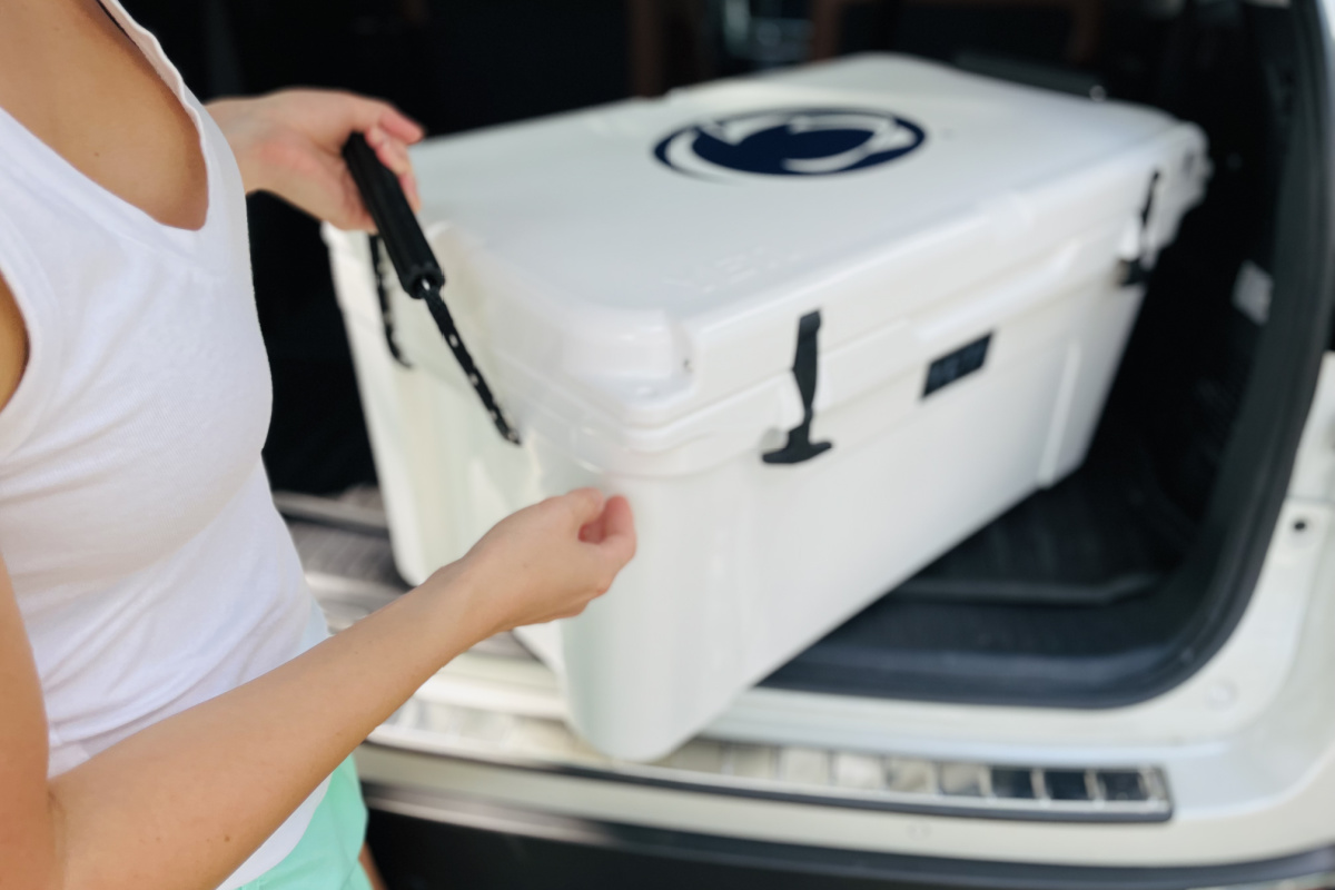 Pulling a YETI cooler out of a car