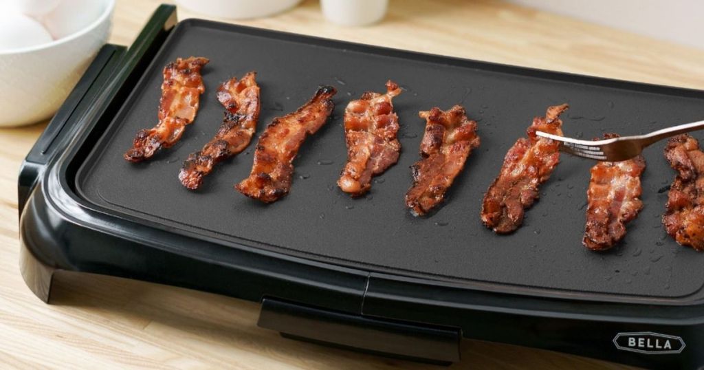 griddle with bacon on it