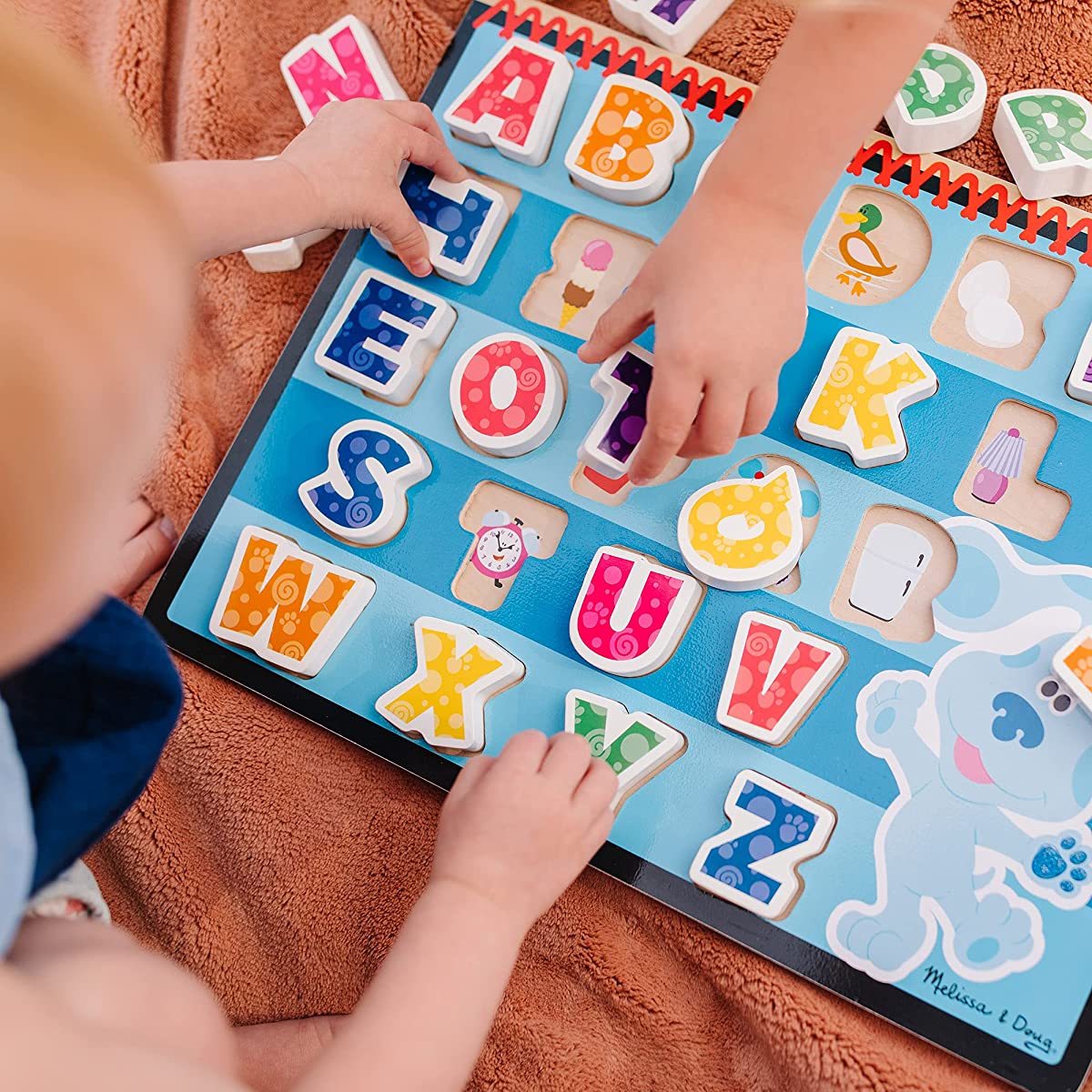 kids playing with a Blue's Clues Chunky Puzzle