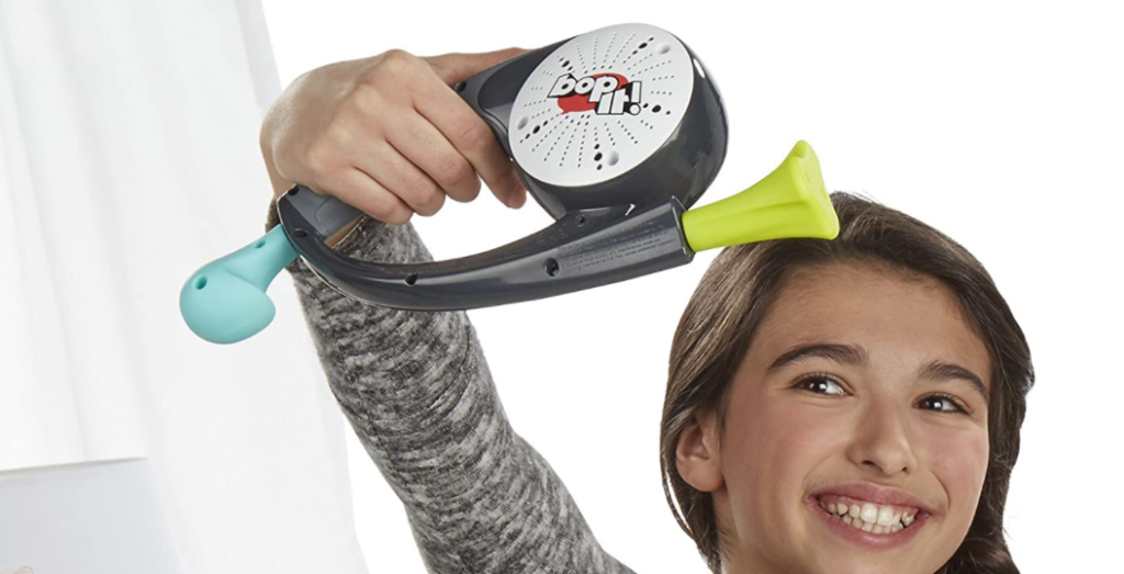 girl playing the Bop It Game
