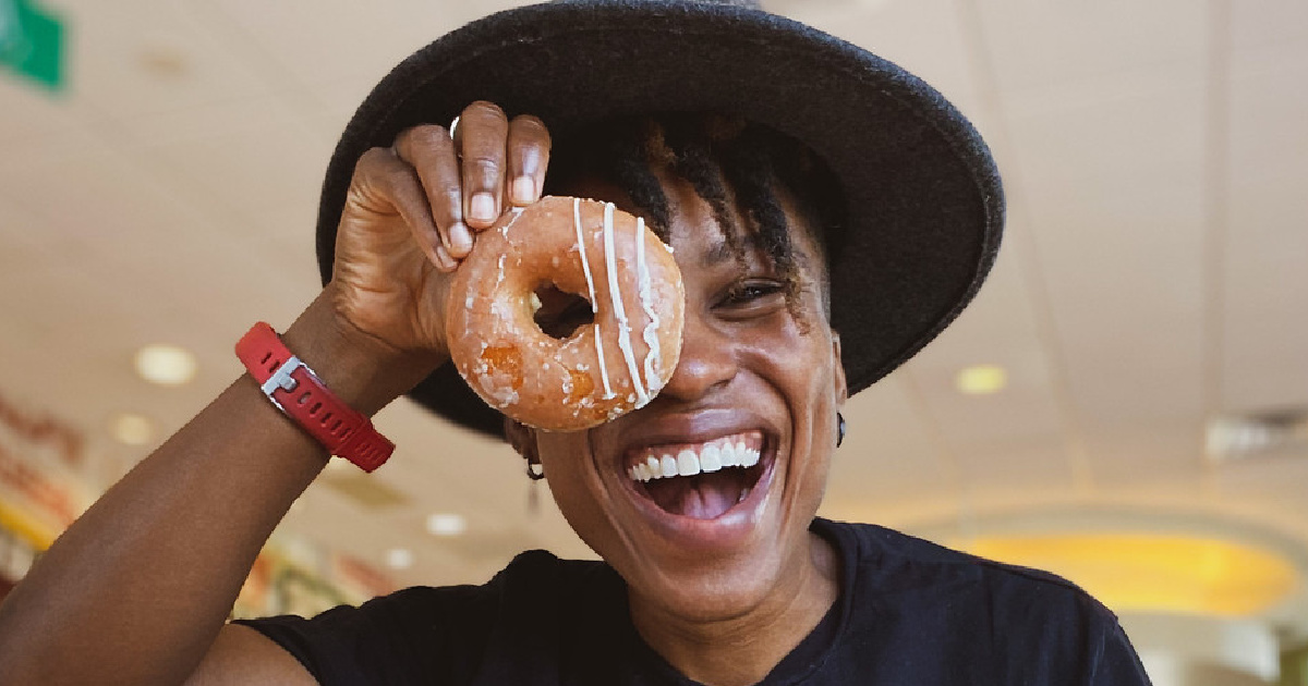 woman with Pumpkin Spice Donut