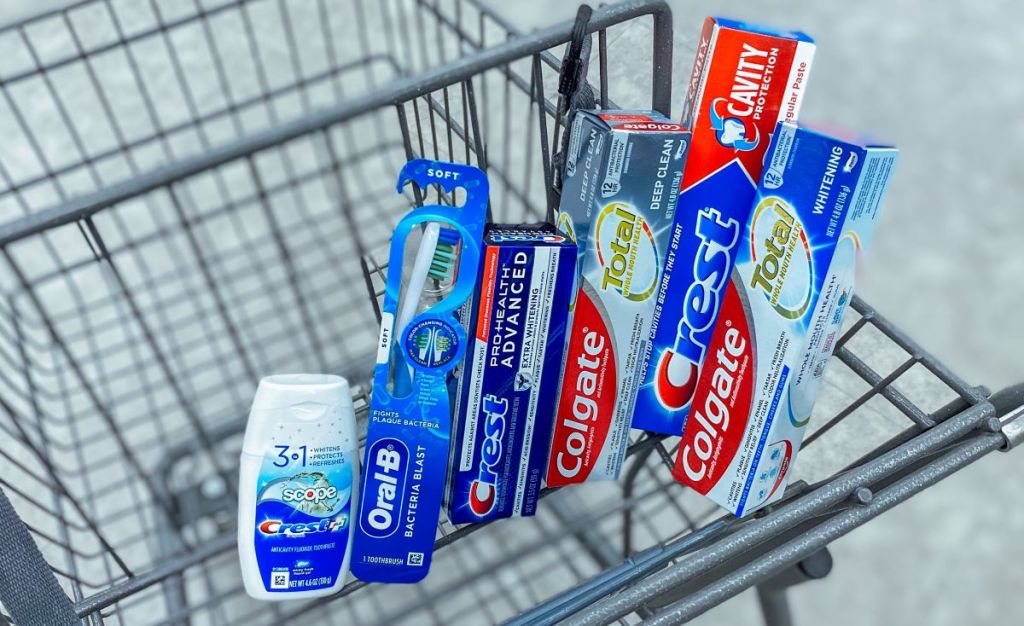 shopping cart with toothpaste and toothbrushes