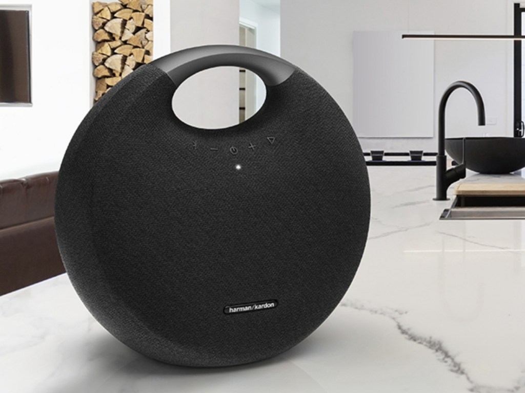 harman kardon onyx studio 6 bluetooth speaker on table