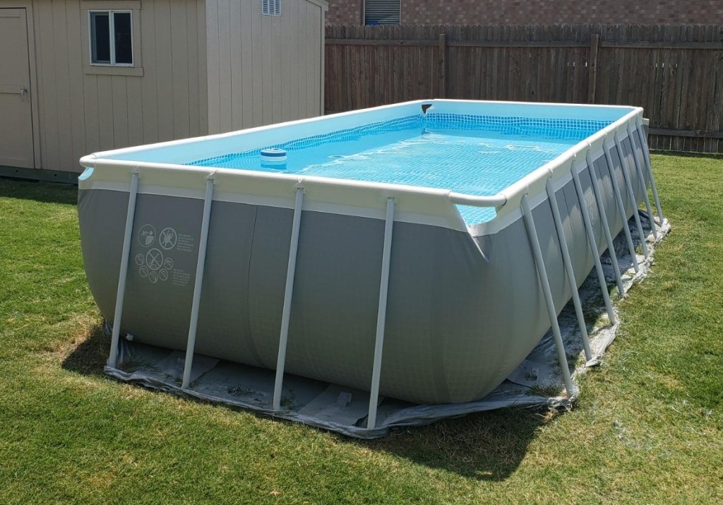Rectangular swimming pool in a yard