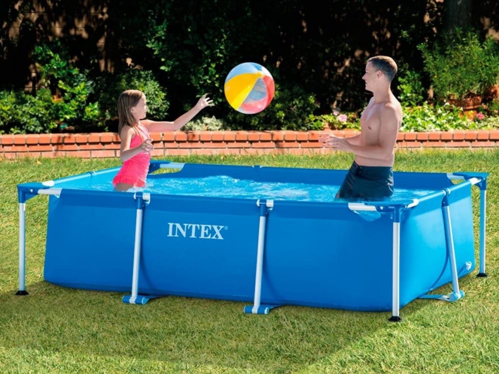 people playing in intex rectangular splash pool