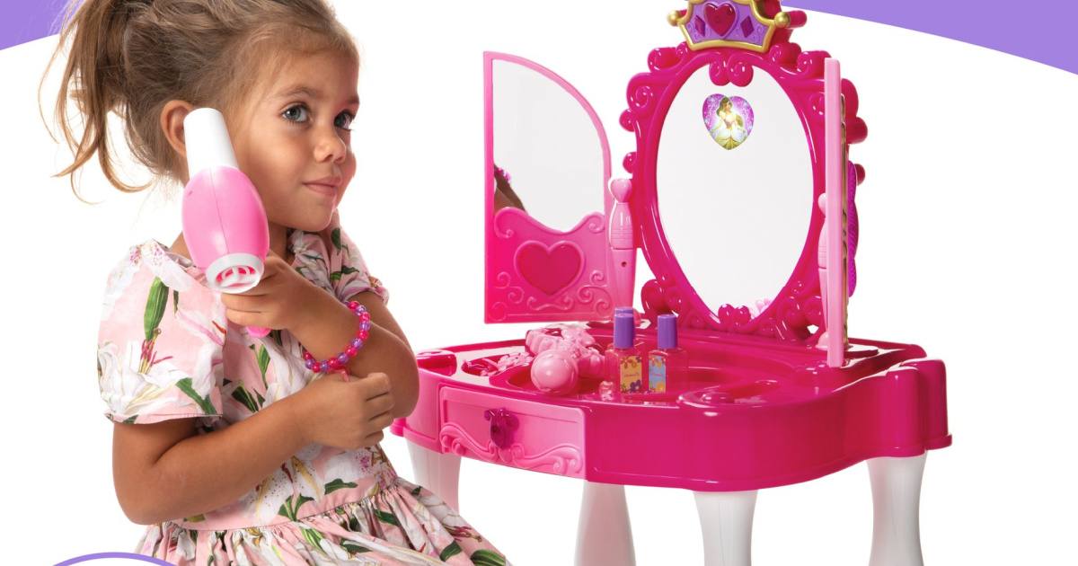 young girl playing with a Kids Princess Vanity Mirror