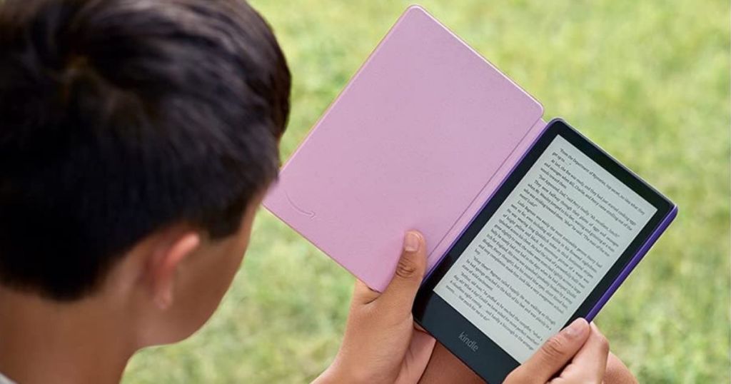 boy reading on Kindle Paperwhite Kids 