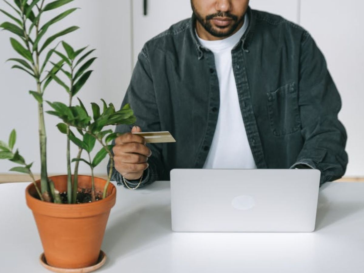Man holding Credit Card and wondering is amazon prime day worth it?