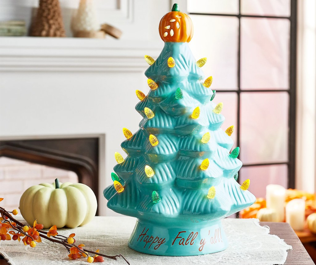 teal ceramic tree with pumpkin topper