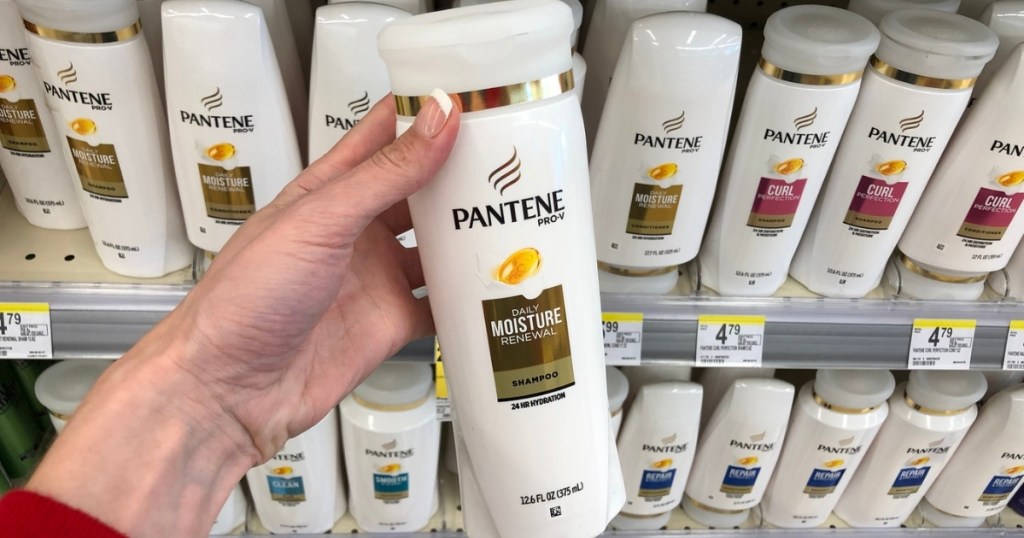 hand holding pantene daily moisture renewal bottle