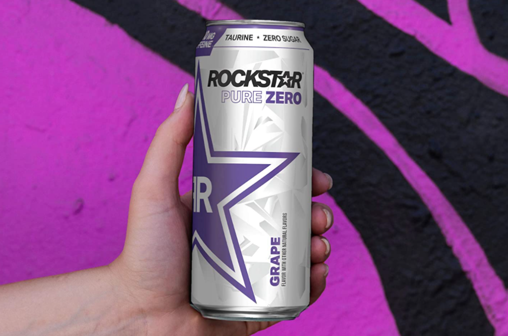 hand holding a can of Rockstar Pure Zero Grape