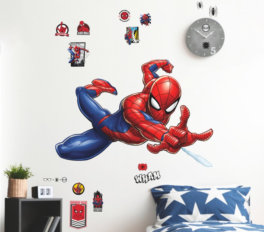 large spiderman decal on bedroom wall