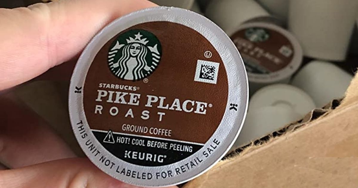 hand holding a Starbucks K-Cup