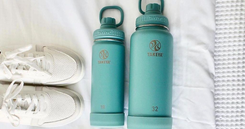 two teal water bottles