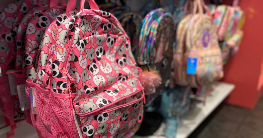 The Childrens Place Backpacks hanging in store