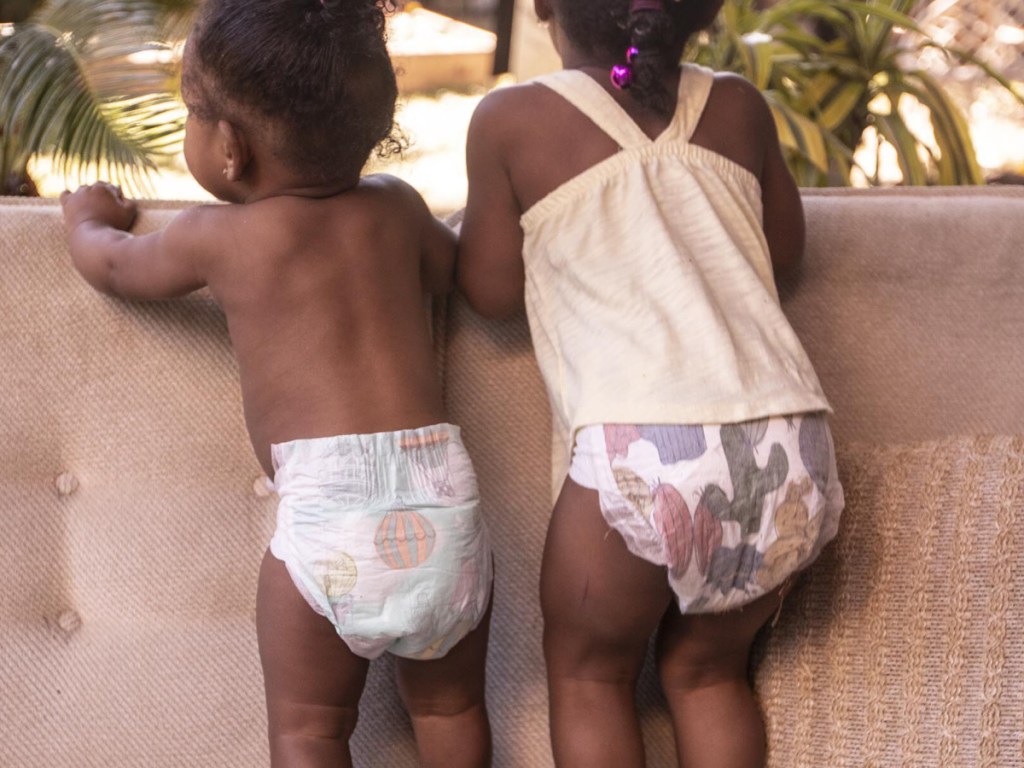 two kids in diapers