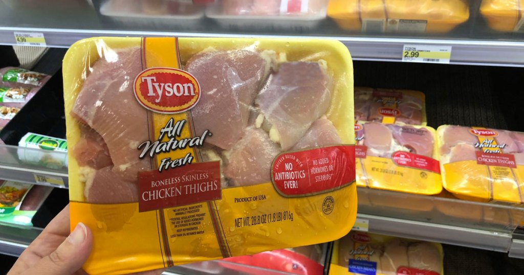 holding package of tyson chicken