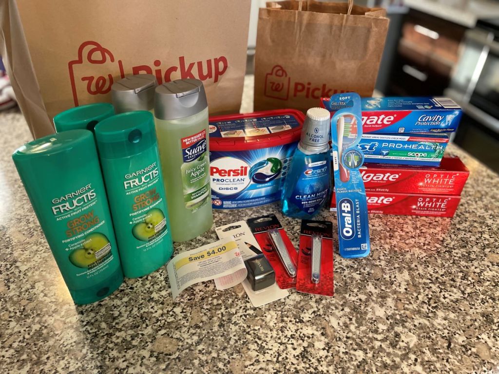group of personal care and beauty products by a Walgreens bag