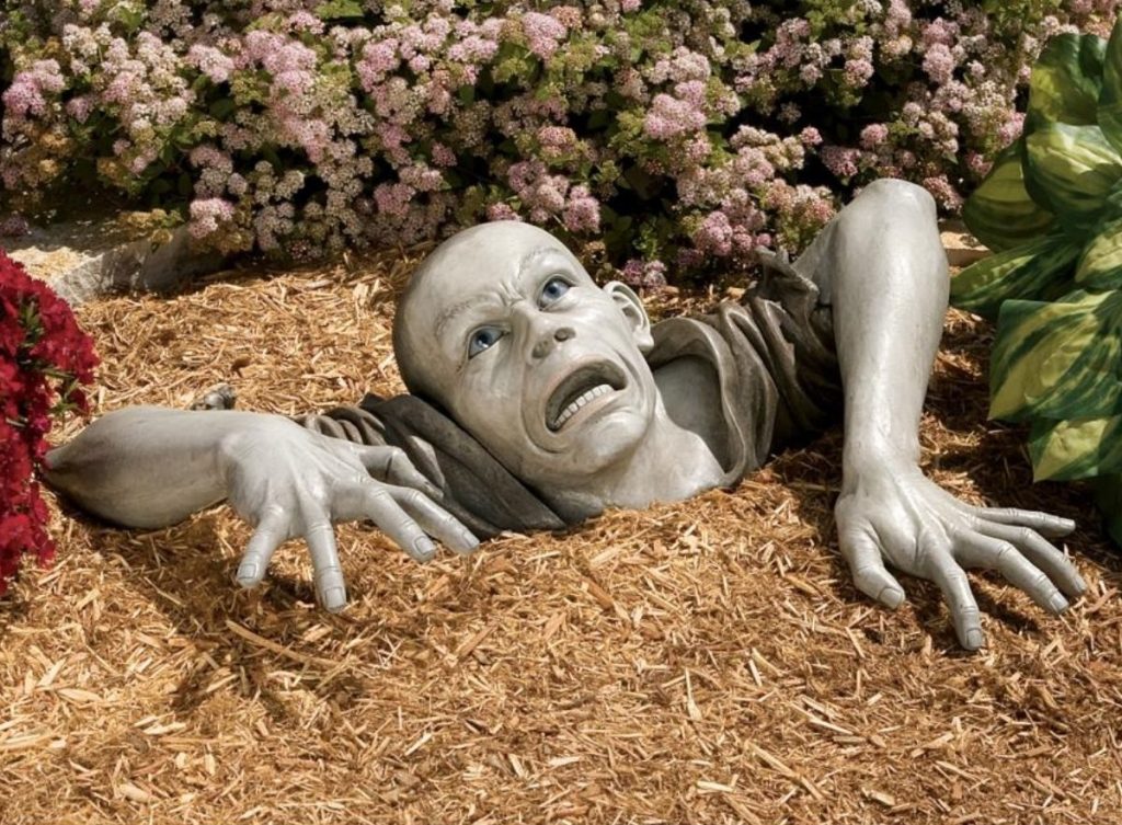 Zombie Statue coming out of the ground