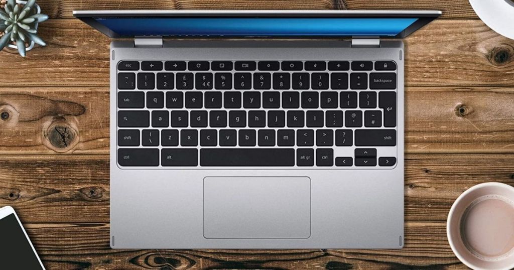 laptop keyboard on wood surface
