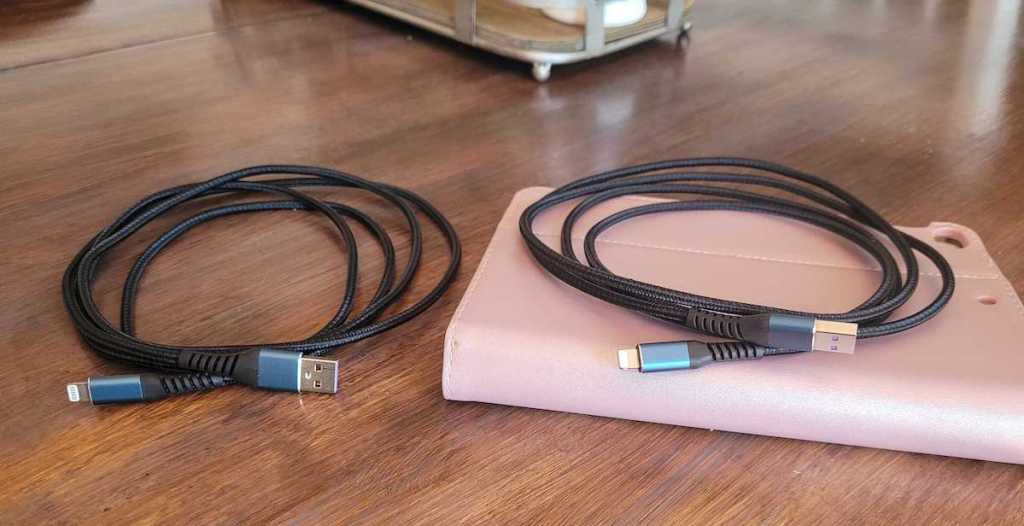 two chargers laying in circles on wood table with pink ipad case
