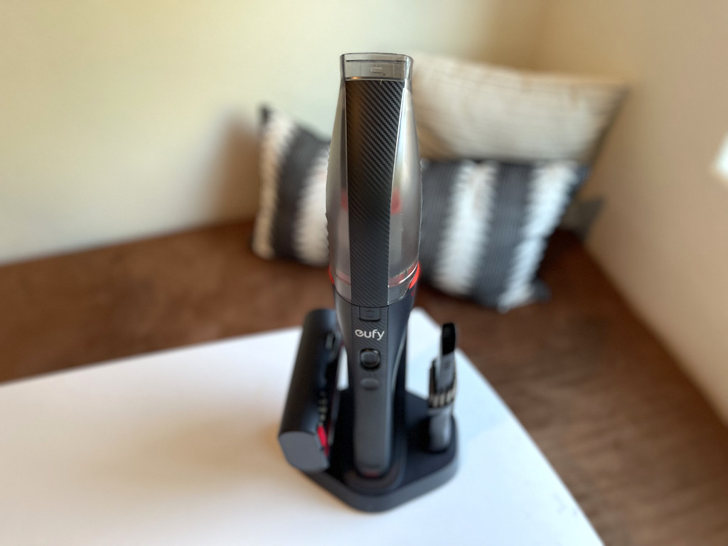 eufy vacuum sitting upright in stand 