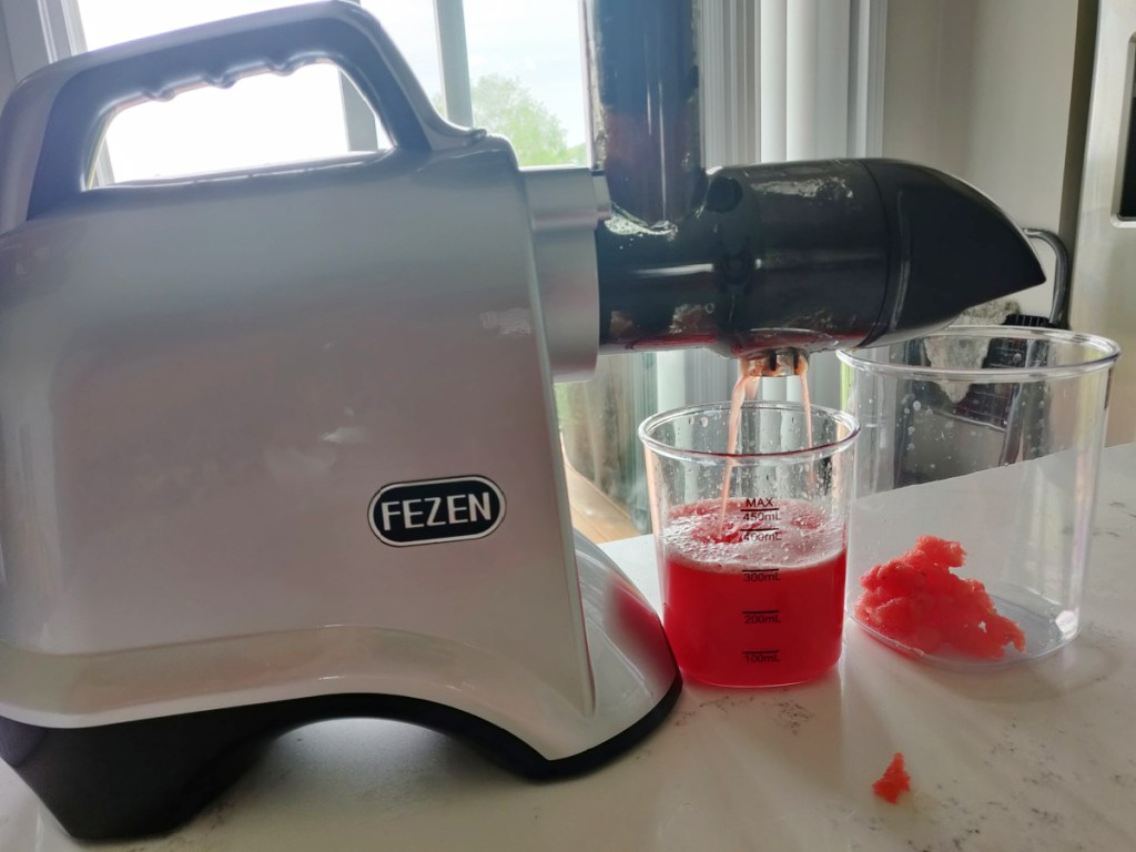 juicer with red juice