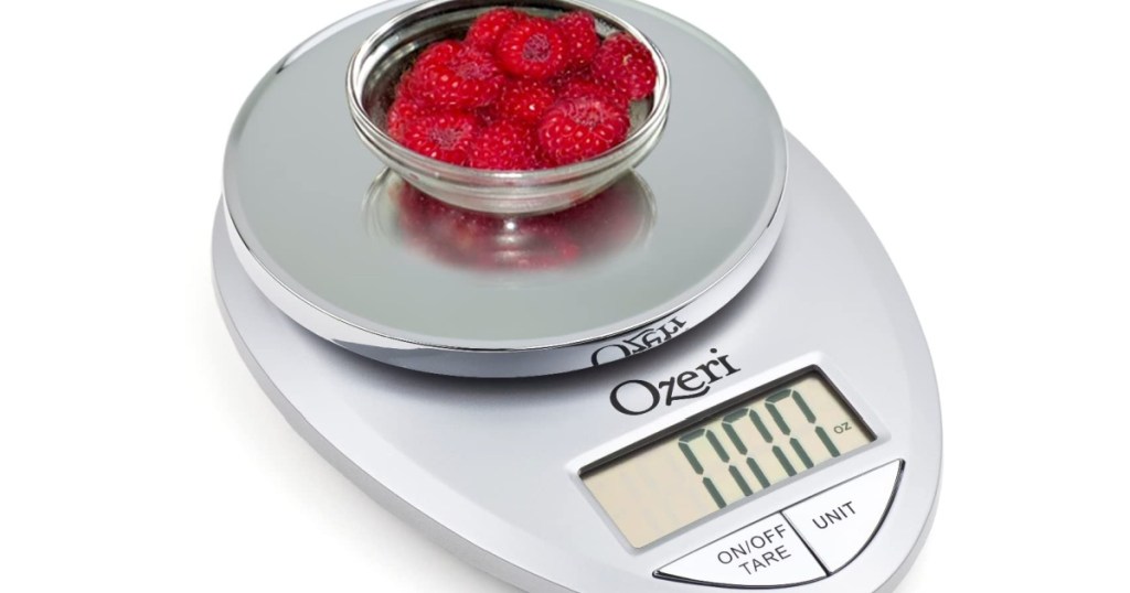 small bowl of raspberries on a silver food scale