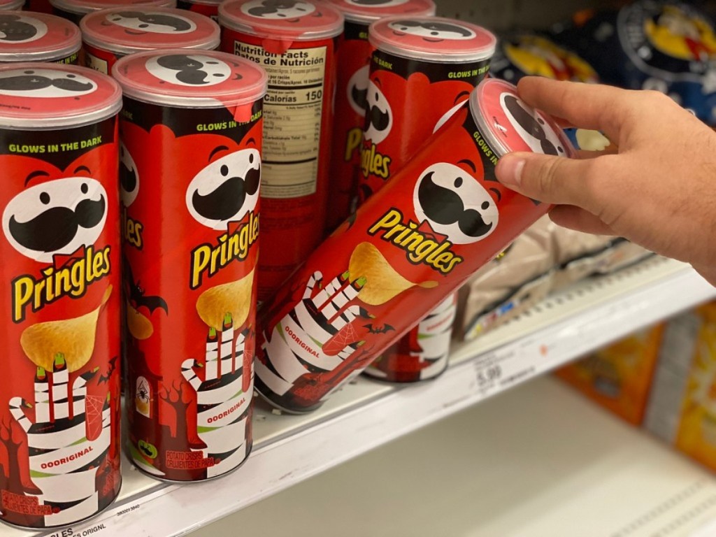taking a can of Pringles off a store shelf