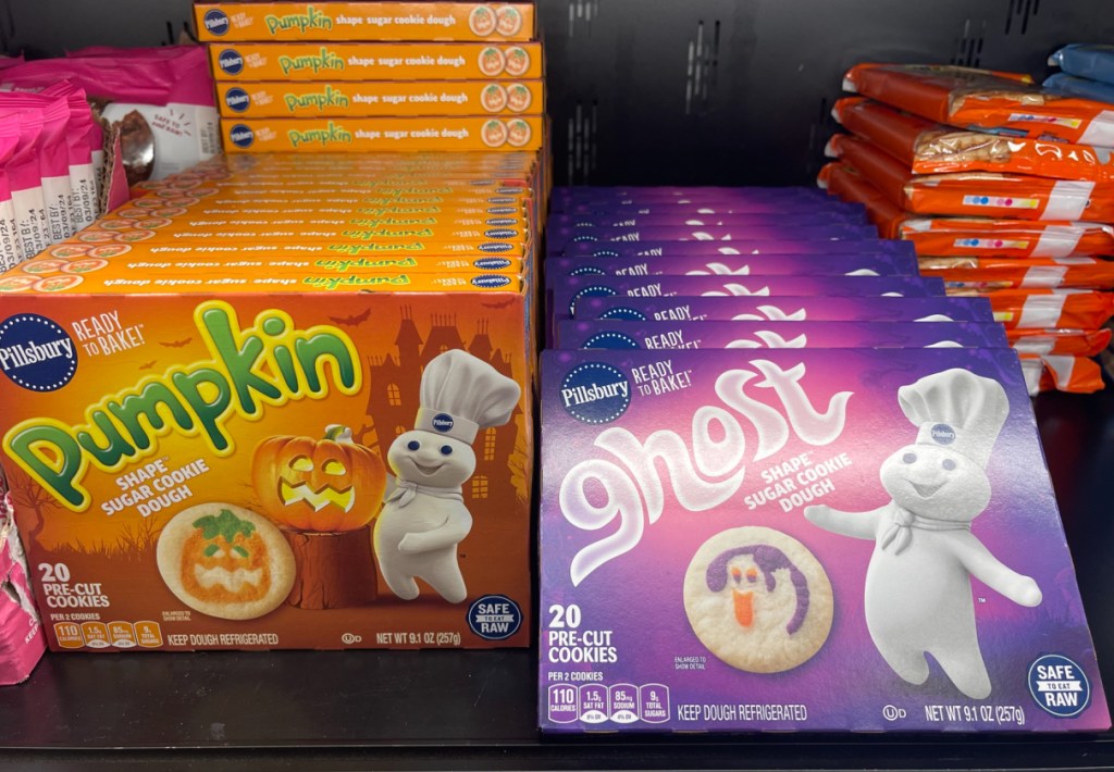 pumpkin and ghost pillsbury cookies displayed at the store