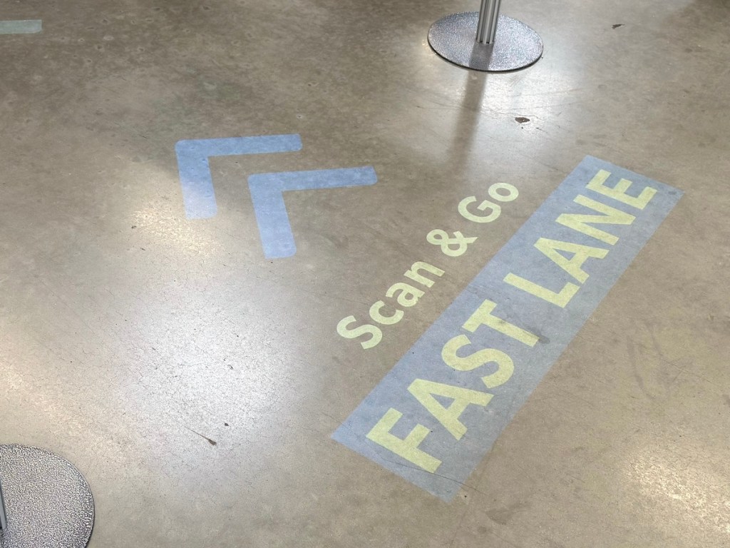 Sam's Club fast lane signage on floor