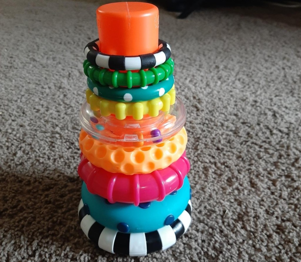 stack of colorful teething circles