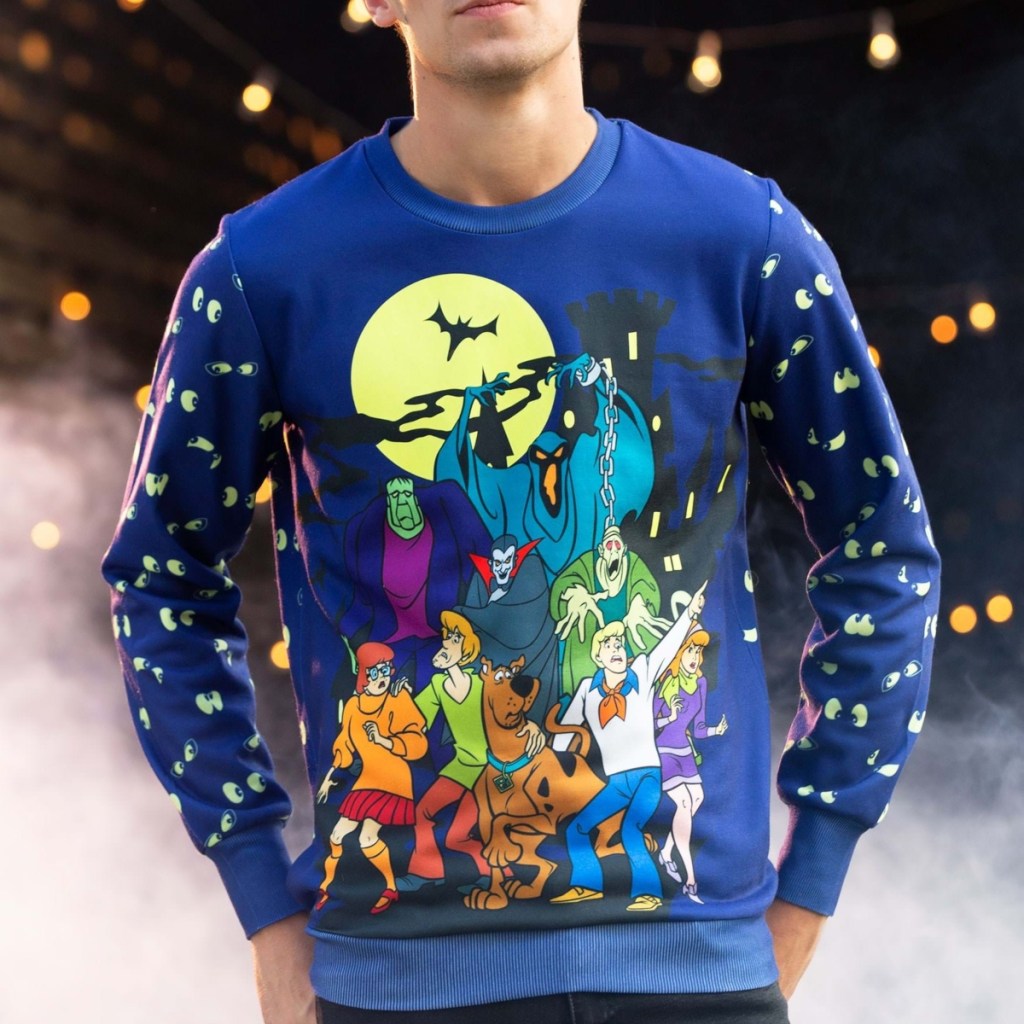 man wearing Scooby Doo sweater