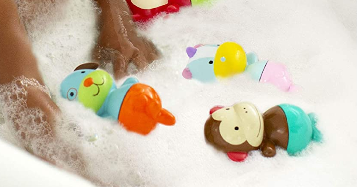 skip hop baby bath toys floating in a tub with bubbles