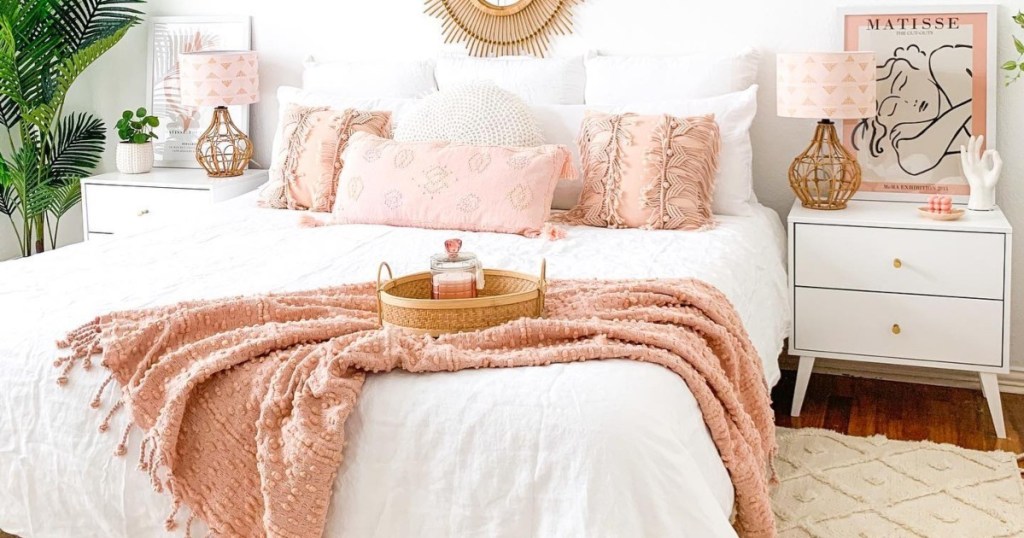 white bedding with pink accents