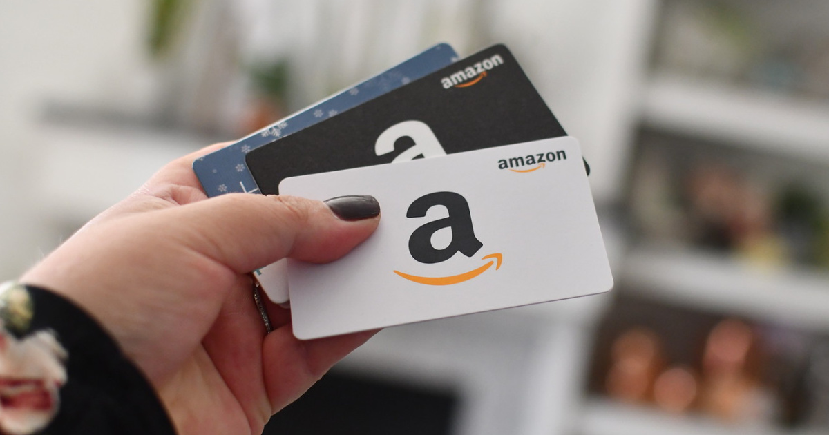 Amazon Gift Cards in hand