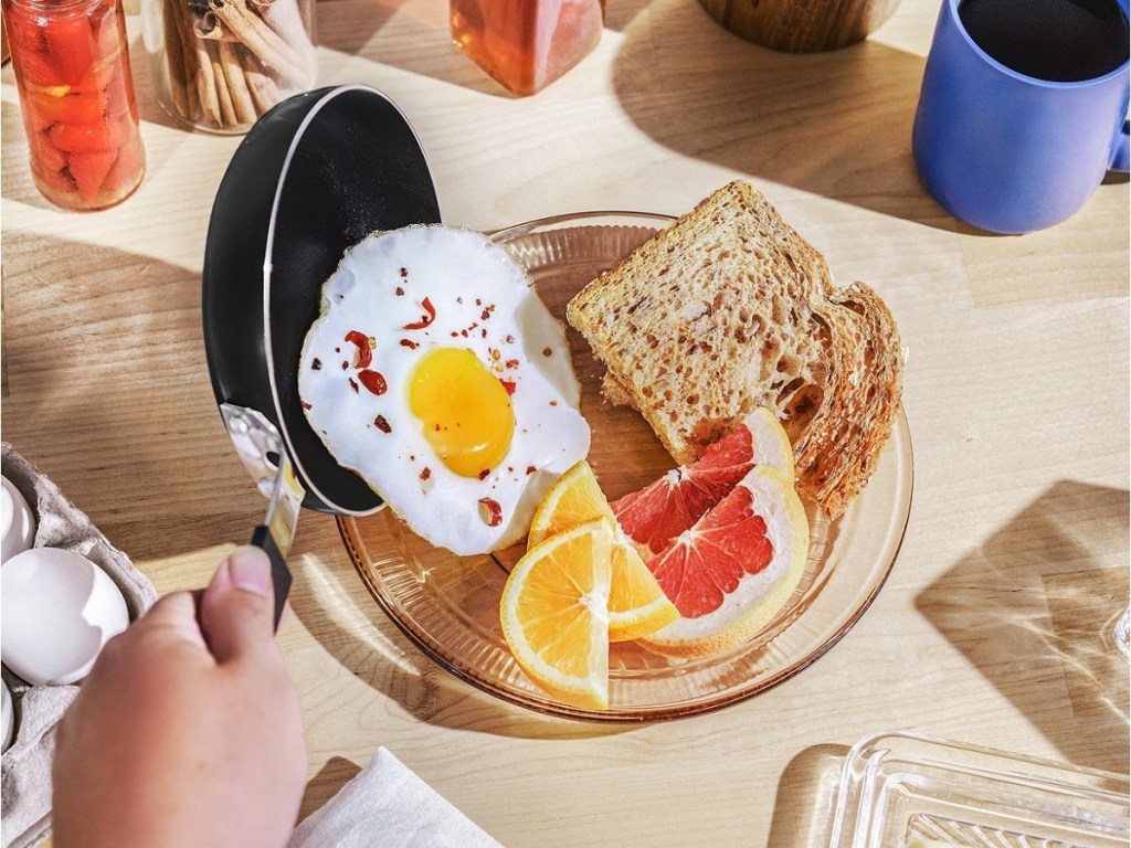 bella mini egg pan with plate of food