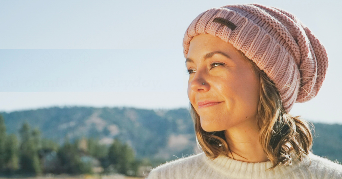 woman wearing pink slouch beanie hat