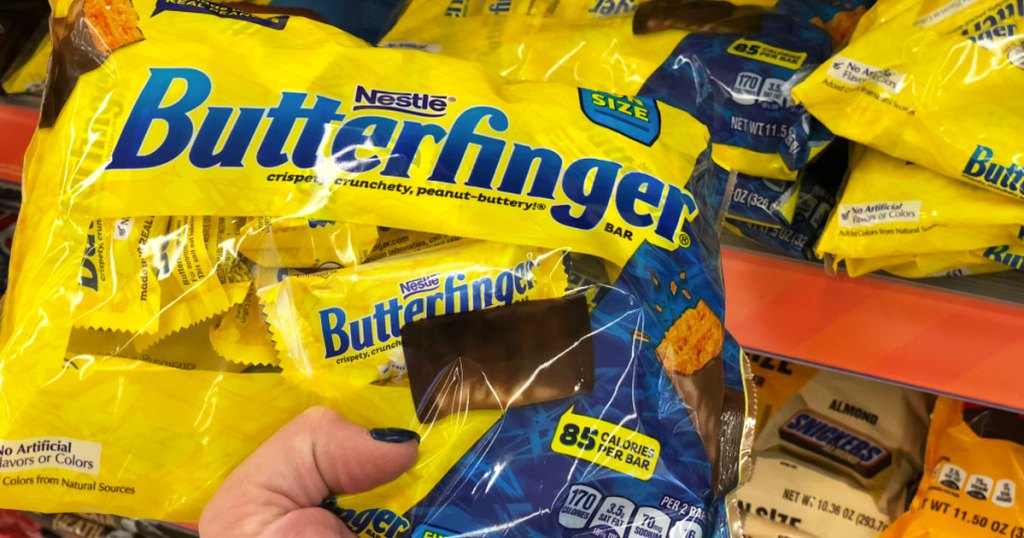 holding bag of butterfinger candy