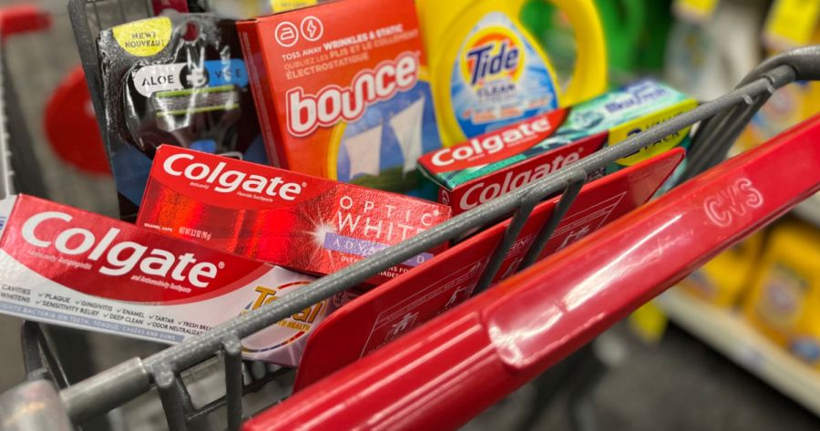laundry care and oral care products in red cart