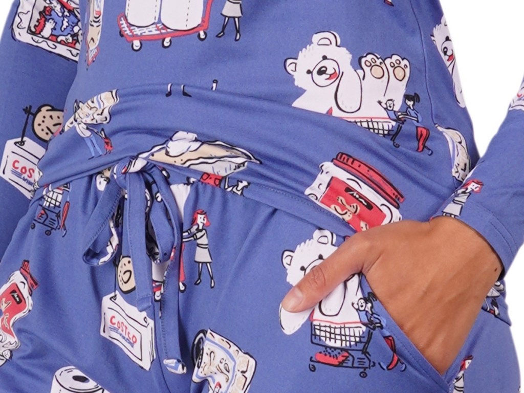 costco-themed ladies pajama set with hand in pocket