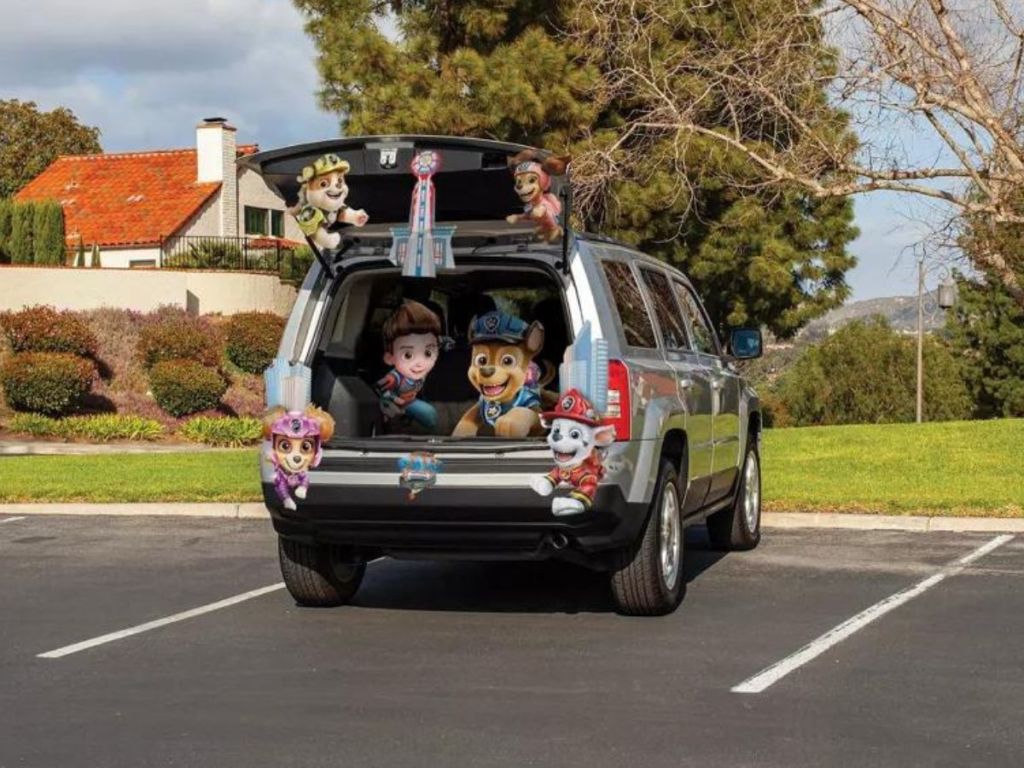 SUV decorated with a Disguise Trunk or Treat Kit featuring Paw Patrol