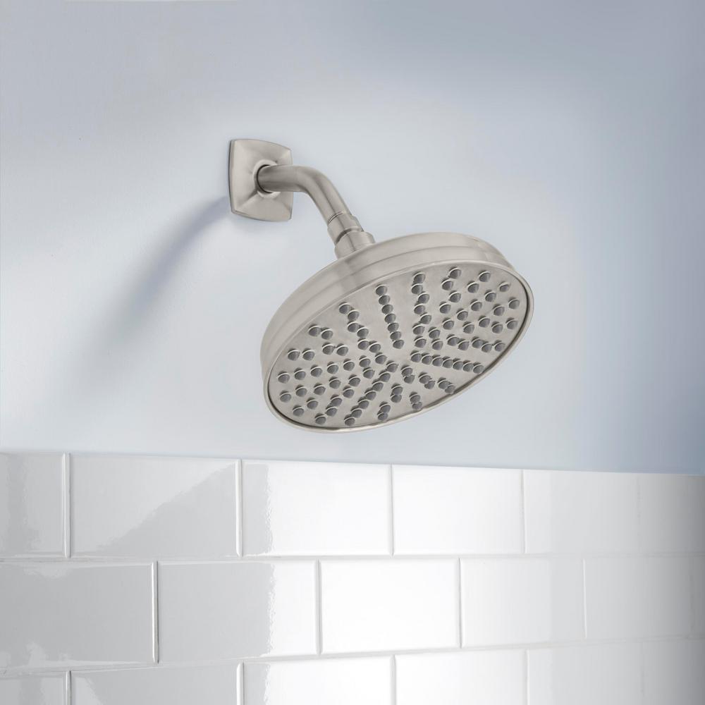 Glacier Bay Shower Head in tiled bathroom