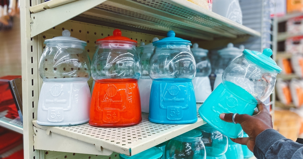 vintage gumball machine cookie jars in multiple colors on store shelf