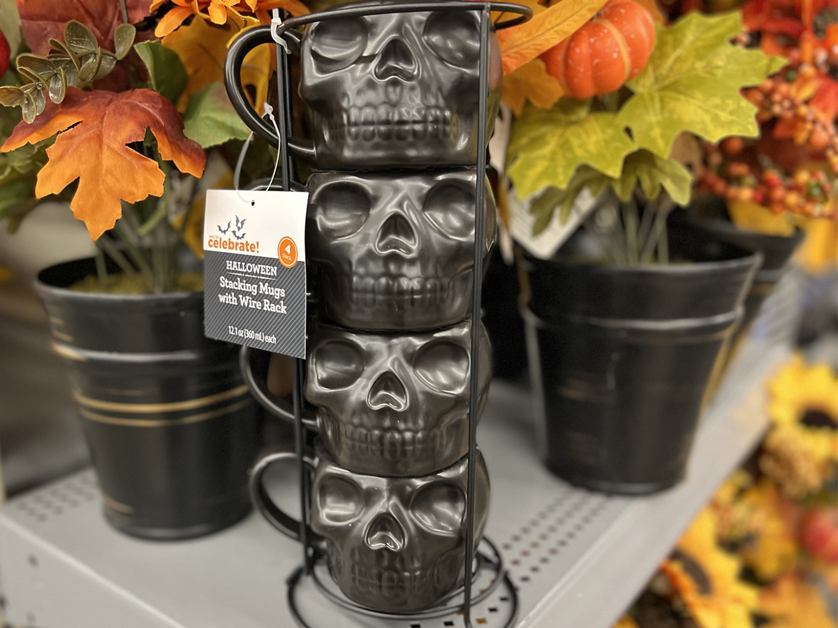 halloween mug stack with fall leaves 