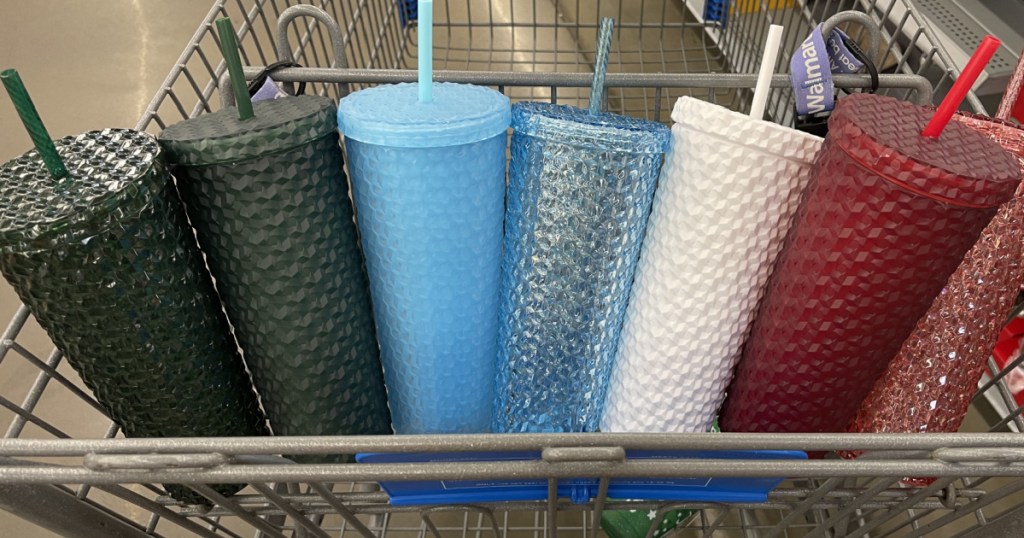 grocery buggy with seven colored cups in the seat